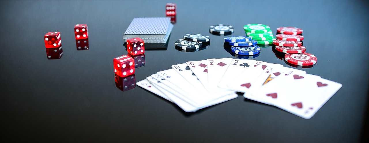 Craps table with two red dice — the canonical American dice game